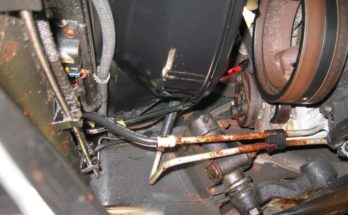 transmission cooler lines on Chevy Silverado covered in rust